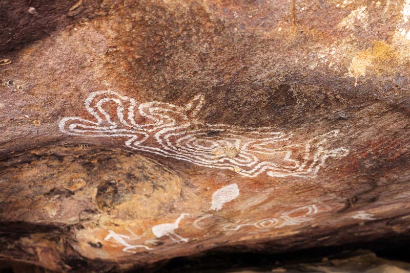 Aboriginal rock art painted on a rock shelter wall in Gundabooka National Park