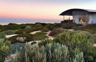Secluded coastal accommodation among low native vegetation on the Yorke Peninsula