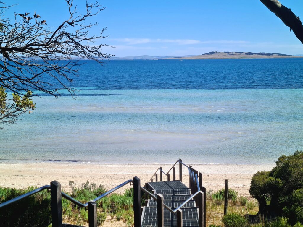 Clear shallow water and a sandy beach on the Eyre Peninsula