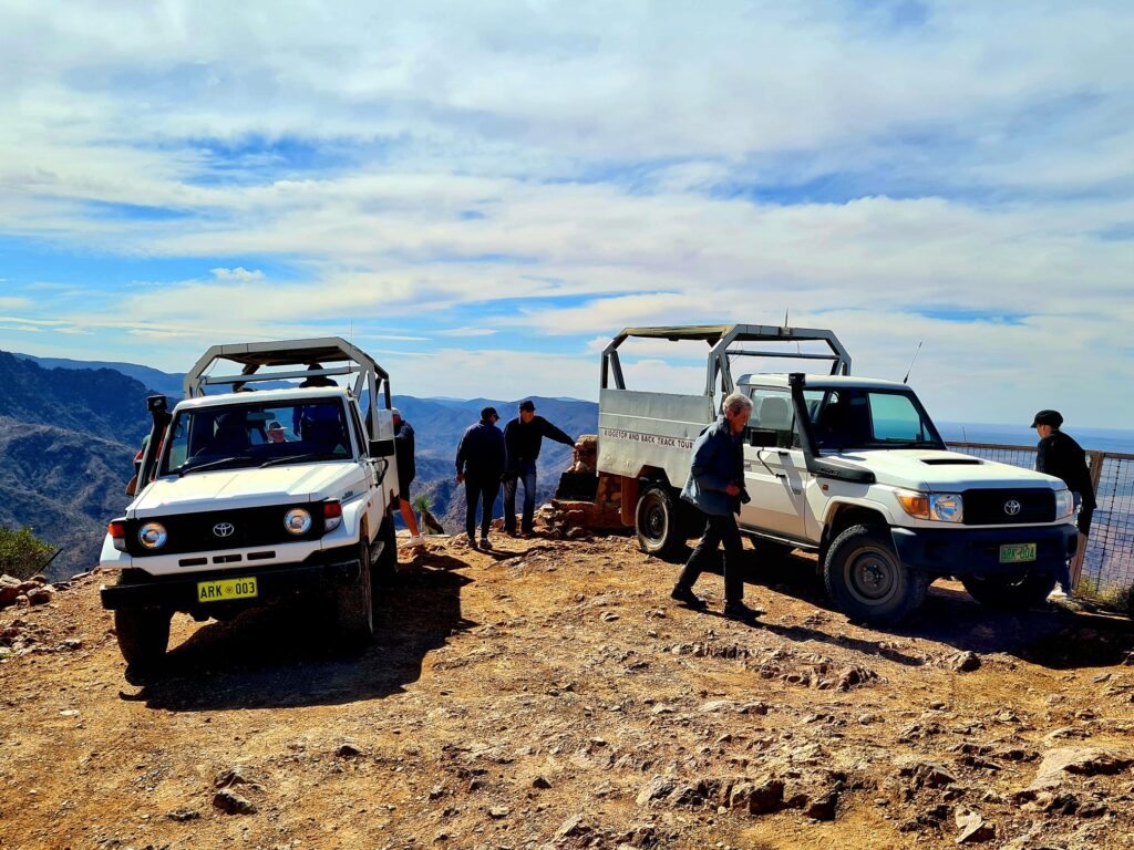 Ridge Top Tour four-wheel-drive vehicles at a high Arkaroola lookout